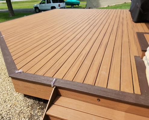 new composite deck being built- Barefoot Construction Deck Construction, Basement Finishings and Home Additions