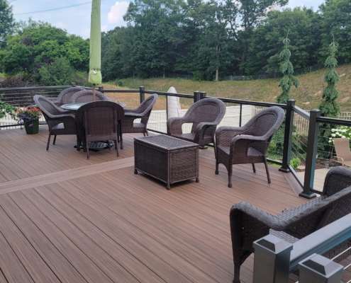 new deck with a pool view and patio furniture - Barefoot Construction Deck Construction, Basement Finishings and Home Additions
