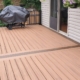 new composite deck with covered grill - Barefoot Construction composite decking