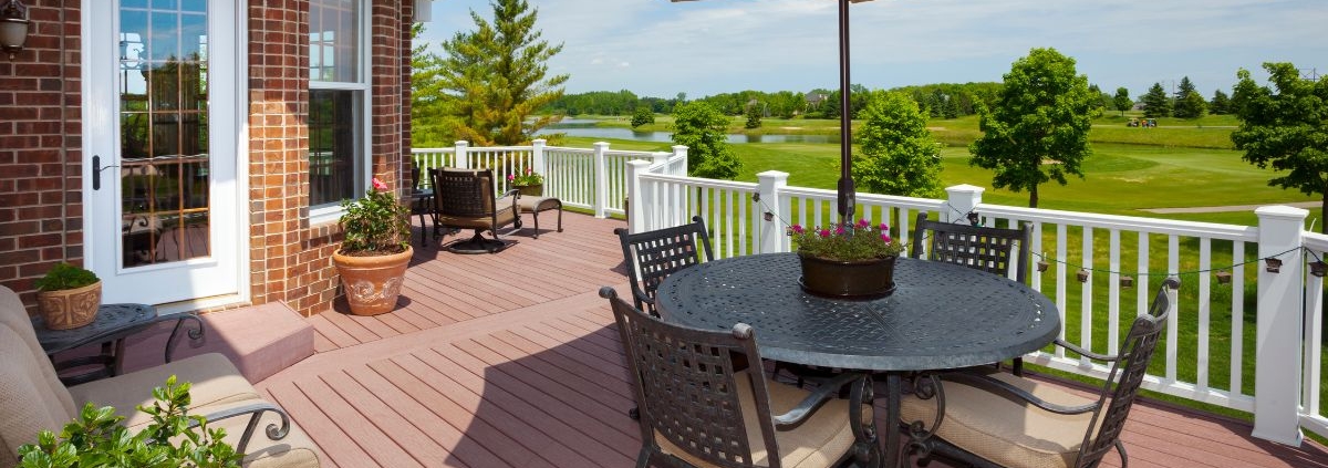 composite deck with patio furniture - Barefoot Construction deck construction