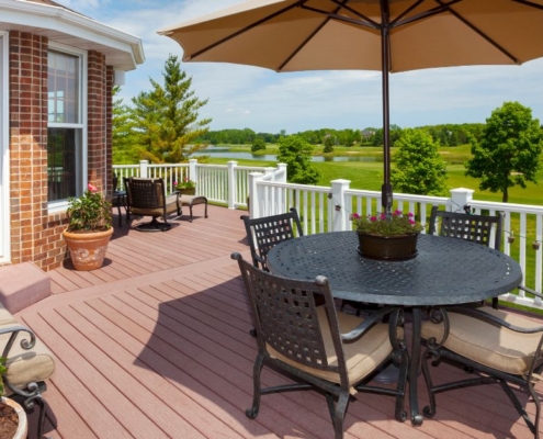 composite deck with patio furniture - Barefoot Construction deck construction