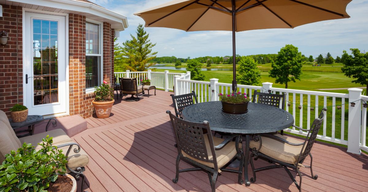 composite deck with patio furniture - Barefoot Construction deck construction