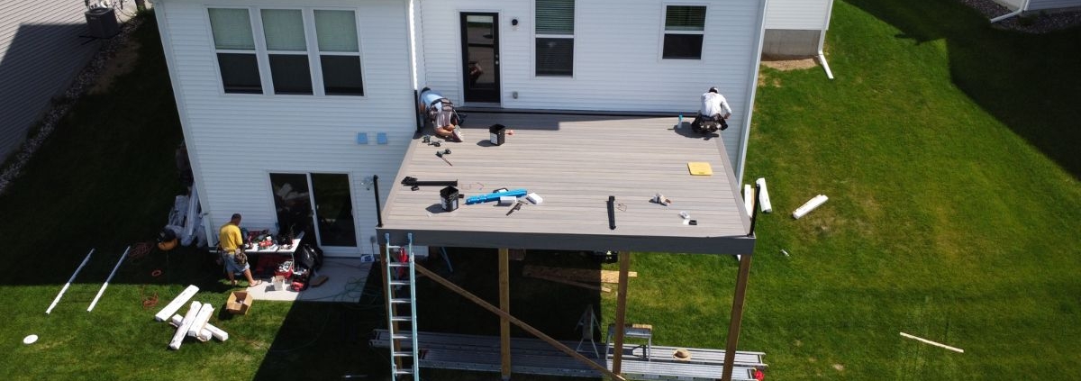 deck construction on a new build home - Barefoot Construction building a deck