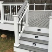 BarefootConstruction-deck-construction-051520244 grey and white deck with black railings - Barefoot Construction Strategic Deck Lighting Ideas