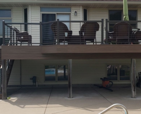 newly built deck with a pool - Barefoot Construction deck builders near
