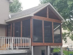 exterior view of a screened in porch - Barefoot Construction Screened Porch vs Deck Minnesota