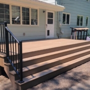 composite deck with black railings - Barefoot Construction composite deck