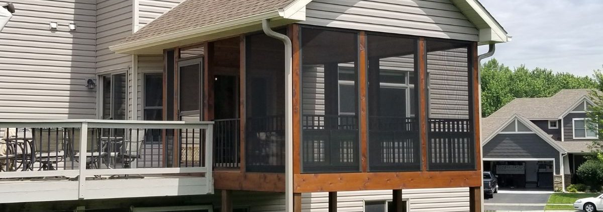 exterior view of a screened in porch - Barefoot Construction Screened Porch vs Deck Minnesota