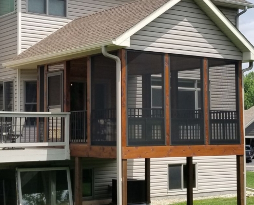 exterior view of a screened in porch - Barefoot Construction Screened Porch vs Deck Minnesota