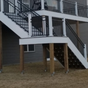 BarefootConstruction-deck-construction-091120243 two level deck with white trim - Barefoot Construction custom deck