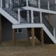 two level deck with white trim - Barefoot Construction custom deck
