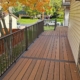 composite deck with black railings - Barefoot Construction Maintenance-Free Decking Lino Lakes