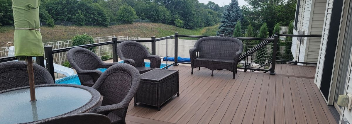 composite deck with patio furniture - Barefoot Construction composite deck construction