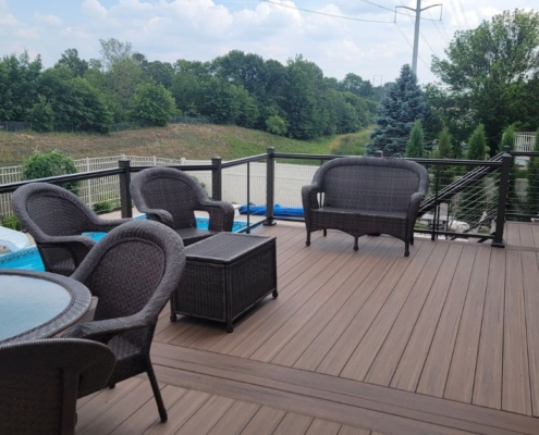 composite deck with patio furniture - Barefoot Construction composite deck construction