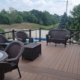 composite deck with patio furniture - Barefoot Construction composite deck construction