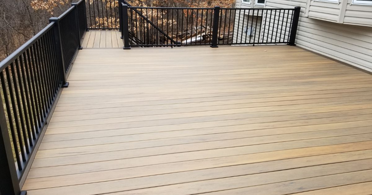 composite deck with black railings - Barefoot Construction
