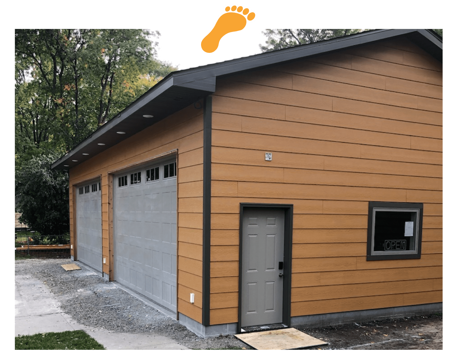 image a white deck with black railings - Barefoot Construction Composite Decks