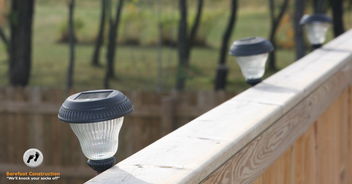 wood deck with black lamps - Barefoot Construction deck construction