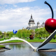 sculpture garden with large metal spoon and a red cherry - Barefoot Construction building a deck
