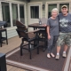 Mitch and Sandy posing on their new composite deck - Barefoot Construction
