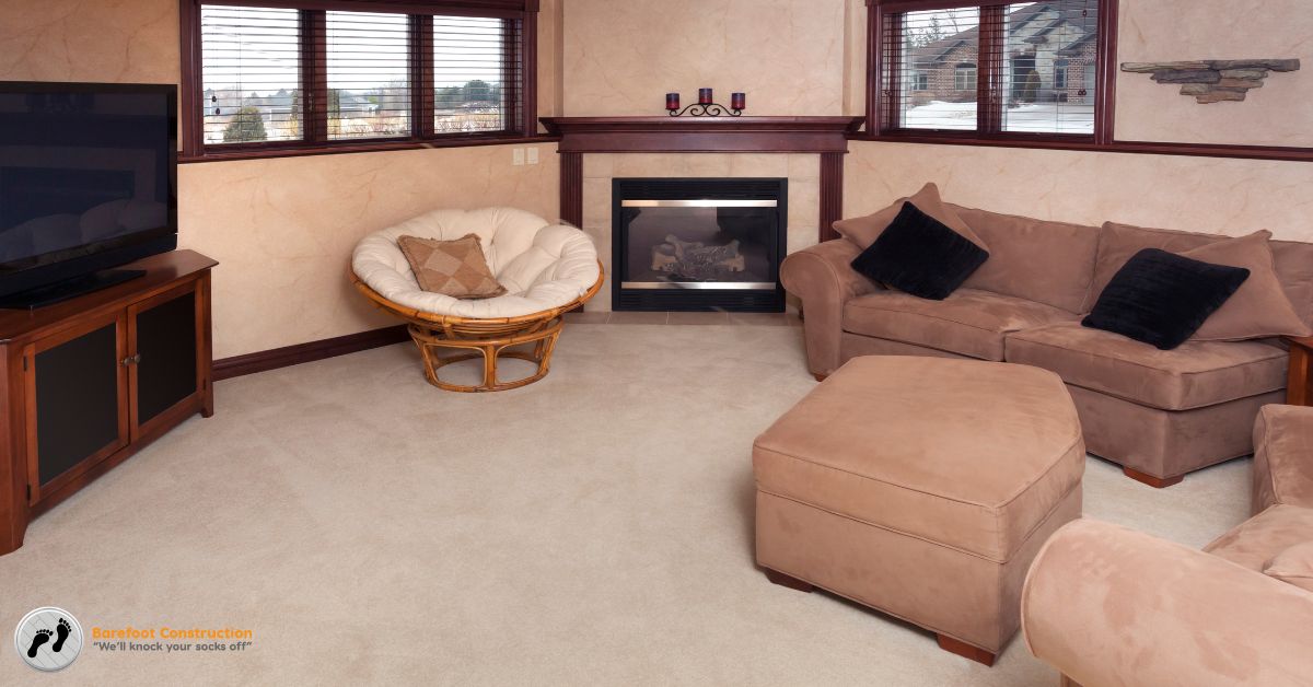 finished basement with dark wood trim and a gas fireplace - Barefoot Construction basement finishing Minnesota