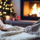 cozy living area with a wood burning fireplace - Barefoot Construction basement finishing Minnesota
