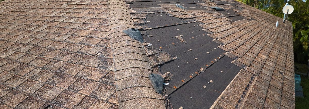 brown roof with missing shingles - Barefoot Construction roof replacement