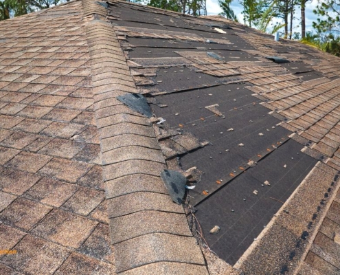 brown roof with missing shingles - Barefoot Construction roof replacement