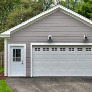 exterior of a detached garage with grey siding - Barefoot Construction Custom Garage Builders in Ham Lake