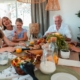 multi generational family eating dinner together - Barefoot Construction accessory dwelling units