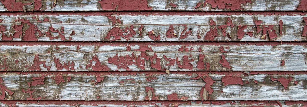 rotting wood deck boards with peeling paint - Barefoot Construction is your old wood deck safe