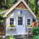 exterior of an ADU with a pile of firewood - Barefoot Construction Accessory Dwelling Unit